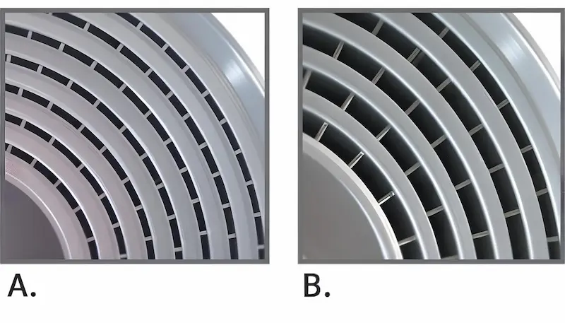 Close-ups of the internal spiral channels of a spiral heat exchanger