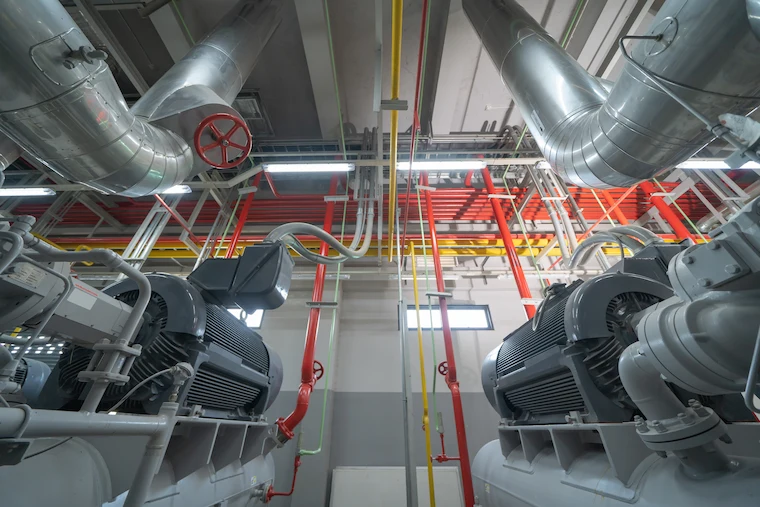 Industrial cooling equipment and piping inside a factory